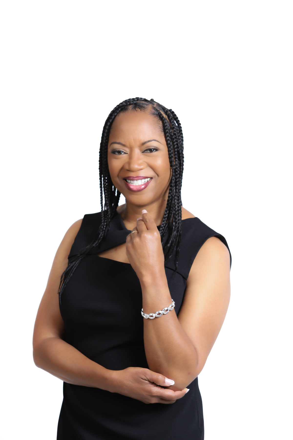 Dinah Rainey smiling in a black dress.